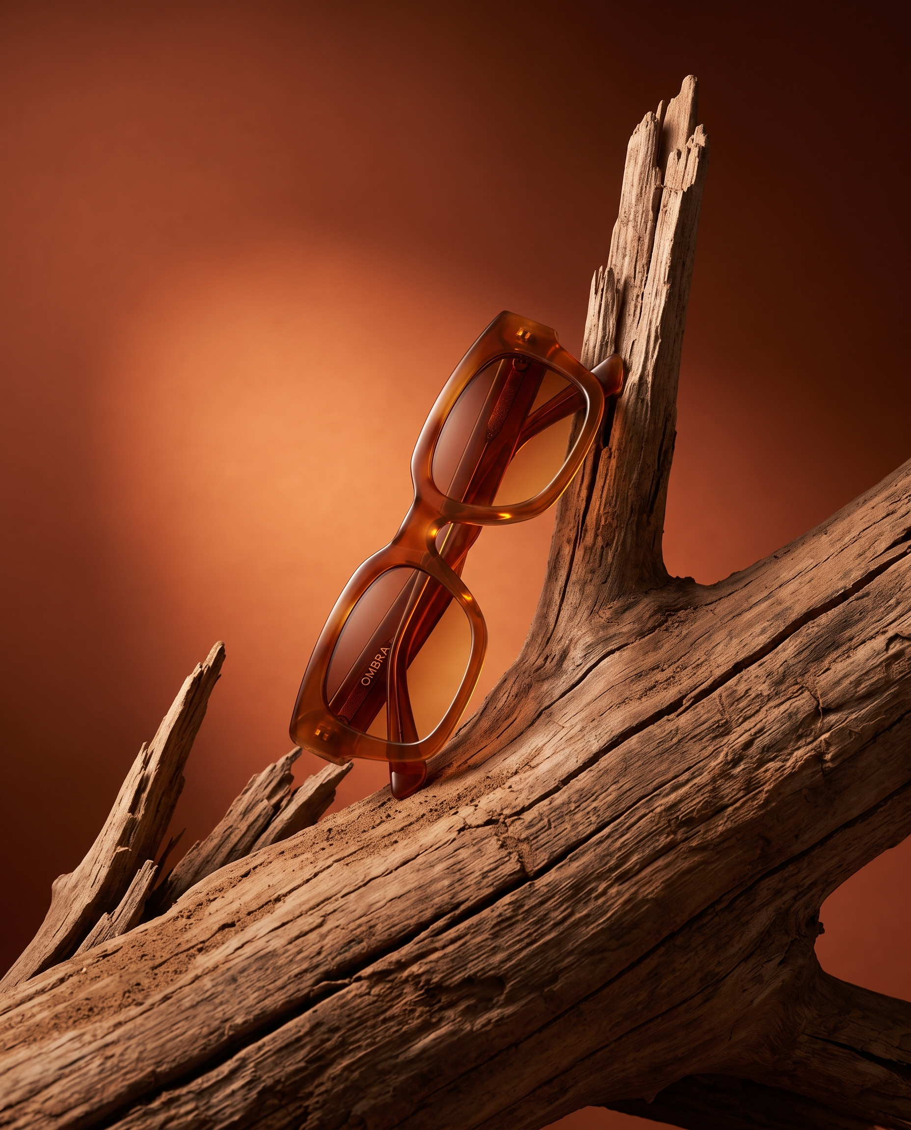 AI-generated: Vertical 4:5 editorial product photograph of designer sunglasses for the fictional eyewear brand "OMBRA". Chunky retro acetate sunglasses in