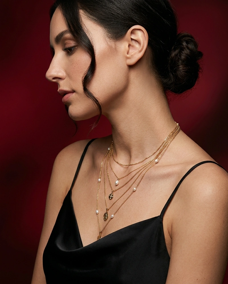 AI-generated: Studio photography, high-end editorial lighting, soft shadows with slight cinematic contrast, refined skin texture, polished and realistic r